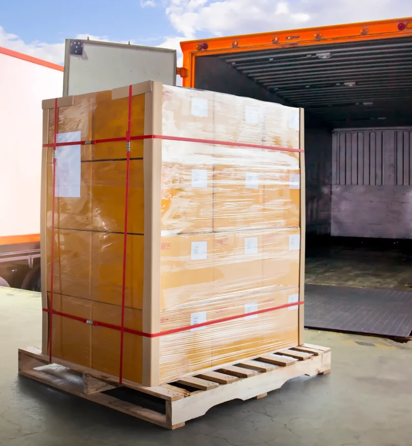 packaging-boxes-wrapped-plastic-pallets-loading-into-shipping-cargo-container-delivery-trucks